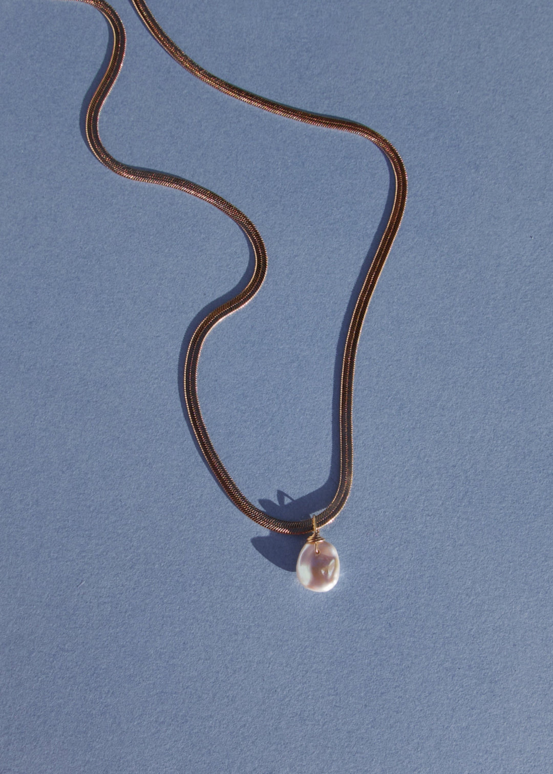 A large keshi pearl necklace with  sleeky solid gold chain