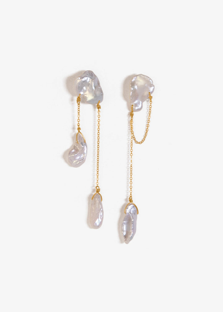 Solid gold earrings with different shaped keshi pearls