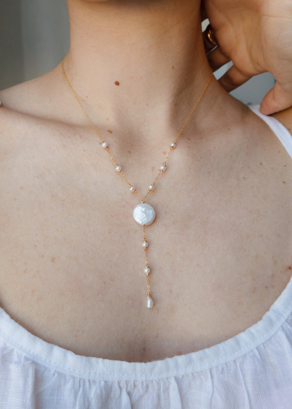 Gold-filled necklace with pearl seeds and a large coin pearl