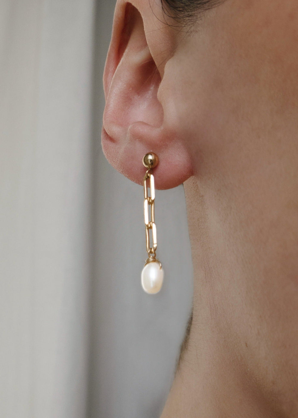 Earrings with freshwater pearl dangling in gold-filled short paperclip chain