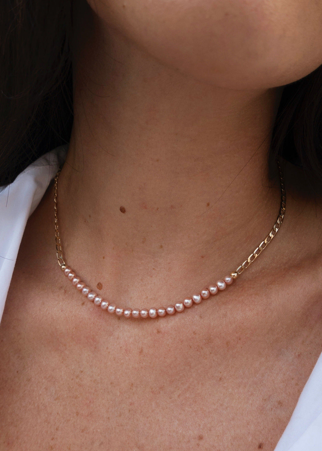 Gold-filled necklace with gold beads and lustrous pink pearls